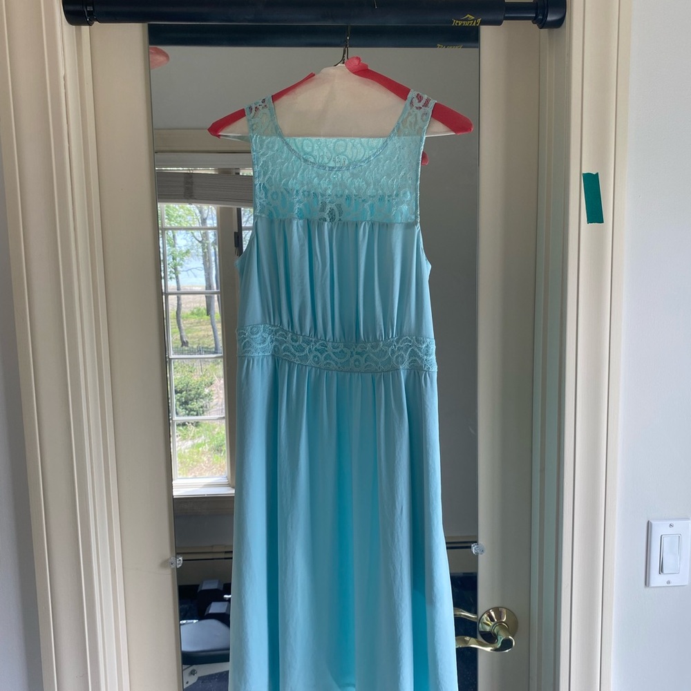 Baby blue women's Anthropologie summer dress.